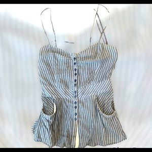 Unique Free People tank top. Blue and white striped. Size 4.